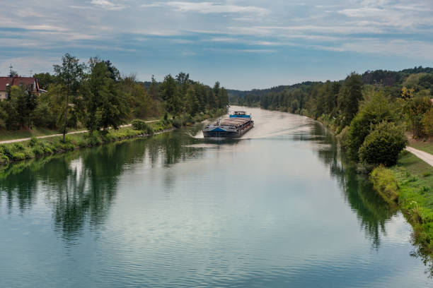 inland vessel on a canal in germany, seen from a bridge