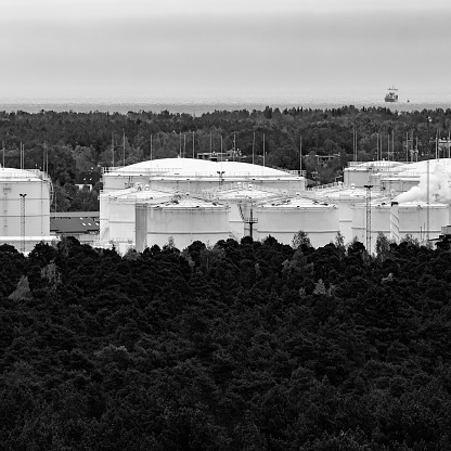 Fuel terminal in Riga. Large oil tanks. Monochrome