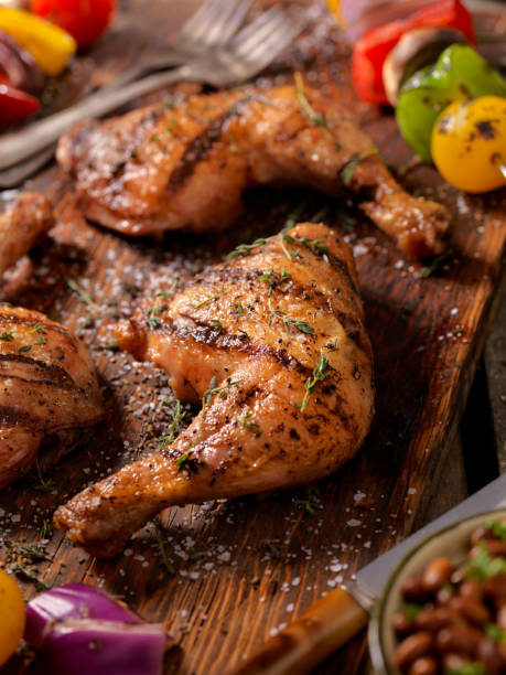 istock Grilled Chicken Legs With Vegetable Skewers 666709204