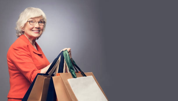 istock Senior lady with shopping bags 666709806