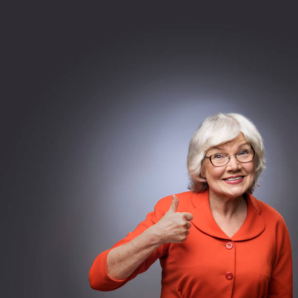 istock Senior lady showing thumb up 666709850
