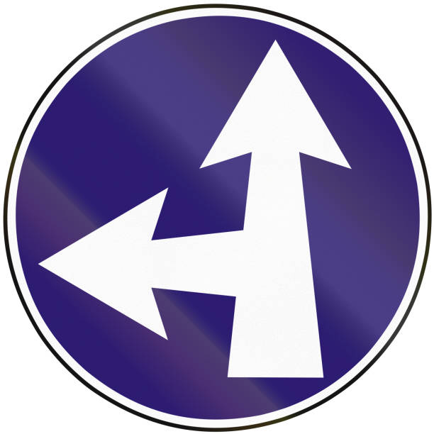 istock Road sign used in Slovakia - Straight or turn left 666712908