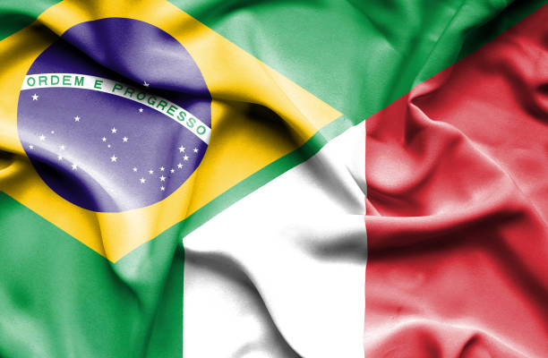 이탈리아와 브라질의 물결 치는 깃발 - brazil serbia stock illustrations