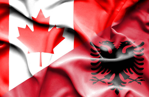 istock Waving flag of Albania and Canada 666717524