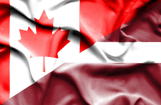 istock Waving flag of Latvia and Canada 666717780