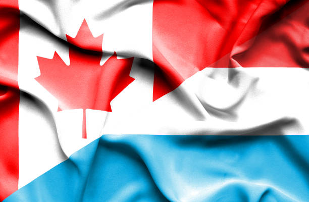 istock Waving flag of Luxembourg and Canada 666717806