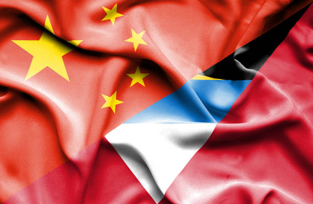istock Waving flag of Antigua and Barbuda and China 666723028