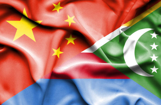 istock Waving flag of Comoros and China 666723168