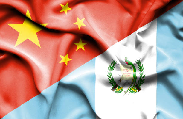 istock Waving flag of Guatemala and China 666723260