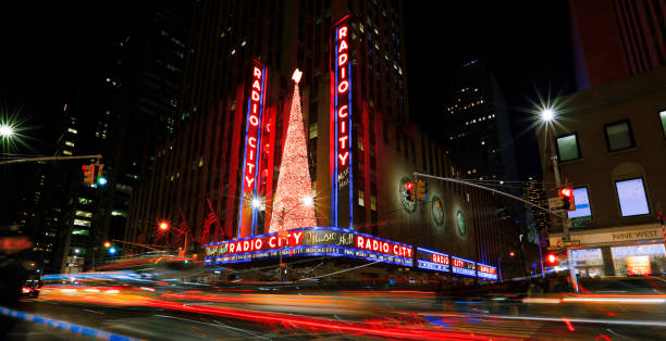 Radio City Music Hall at Christmas. New York City, USA- January 1, 2017: Bright Christmas lights of Radio City Music Hall in New York City at night. new york city skyline new york state night stock pictures, royalty-free photos & images