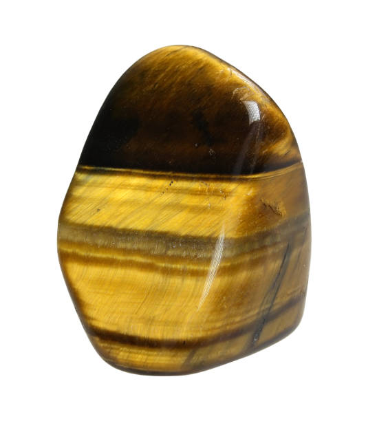 istock Tiger Eye mineral - macro isolated on white background 666735212