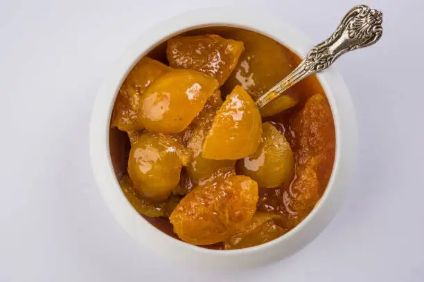 Close up view of Nimbu Meetha Achar - A sweetened version of the popular lime Pickle.