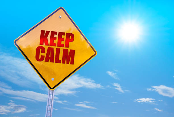 istock keep calm word on yellow traffic sign blue sky background 666748372