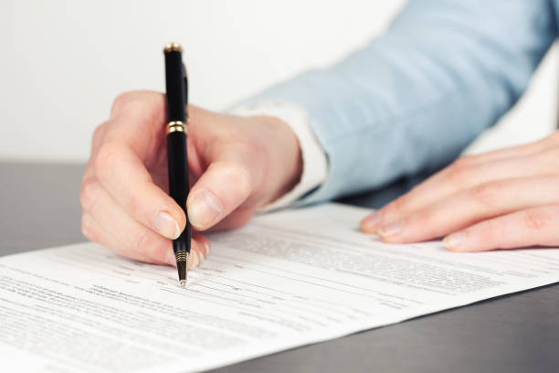 istock Business woman signing contract 666754282