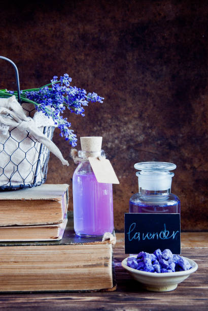 istock Lavender flowers, lavender essential and old books 666759604