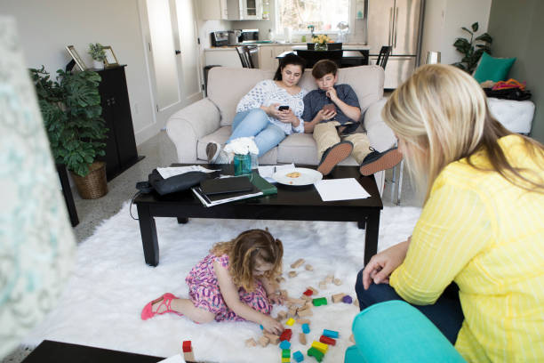 istock A mom plays with her daughter at home 666759658