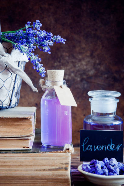 istock Lavender flowers, lavender essential and old books 666760430