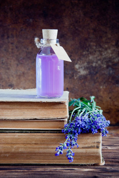 istock Lavender flowers, lavender essential and old books 666762782