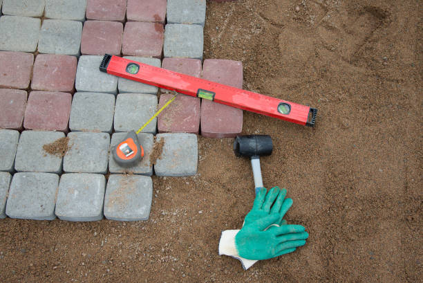 istock stone blocks rubber hammer level gloves and tape measure 666764000