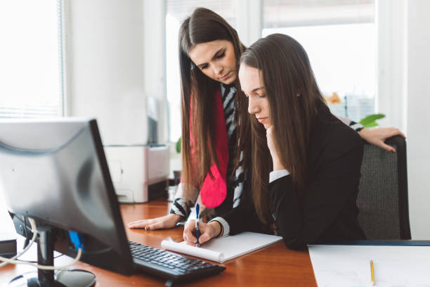 istock CEO looking at the work of an employee 666764494