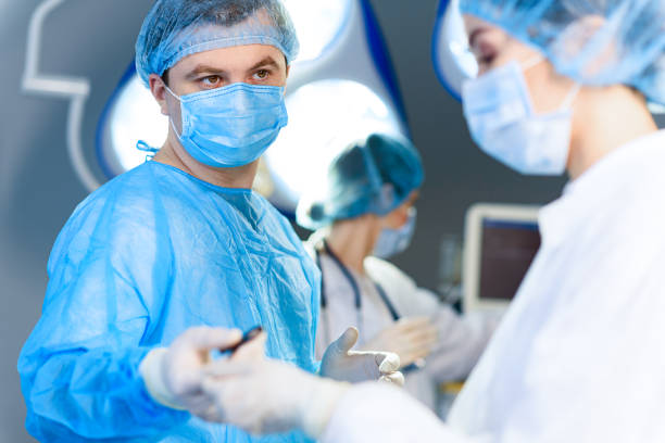 istock Attentive doctor holding medical tool 666770378