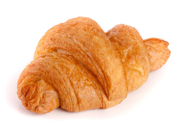 istock one croissant isolated on white background closeup 666772452