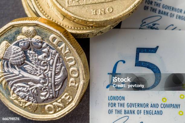 New Five Sterling Pounds Note And One Pound Coin Stock Photo - Download Image Now - British Currency, Stack, British Pound Note