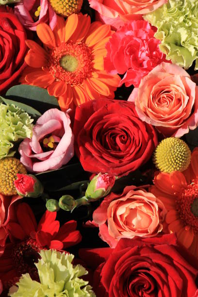 istock orange and red wedding flowers 666801478
