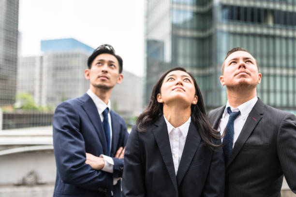 istock Japanese business persons have fun and laughing 666801496