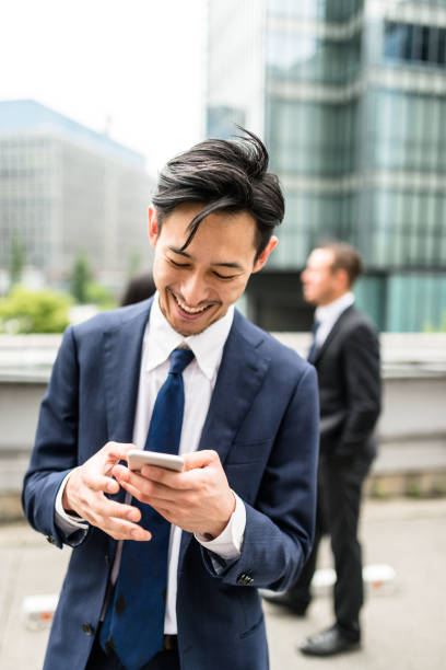 istock Japanese business persons have fun and laughing 666801972
