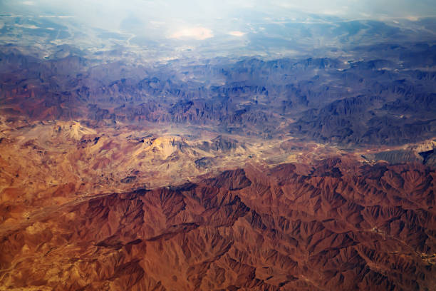 istock Aerial view from air plane of desert mountains 666802036