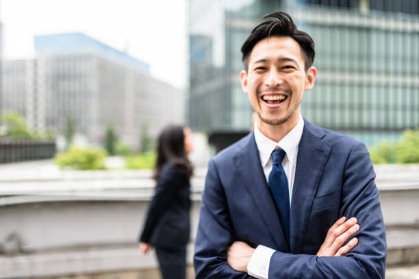 日本のビジネスパーソンがある楽しさと笑い - business teamwork meeting business person ストックフォトと画像