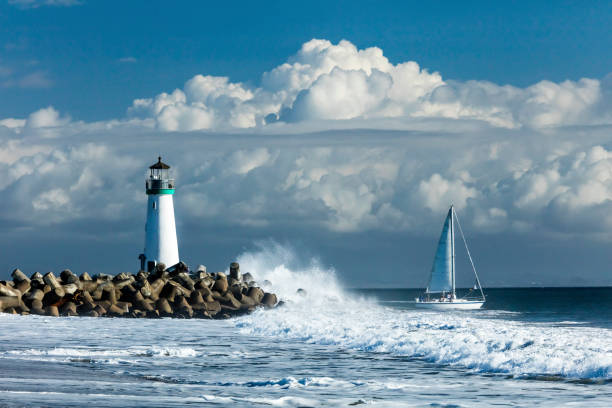 lighthouse walton on santa cruz shore - storm lighthouse cloudscape sea imagens e fotografias de stock