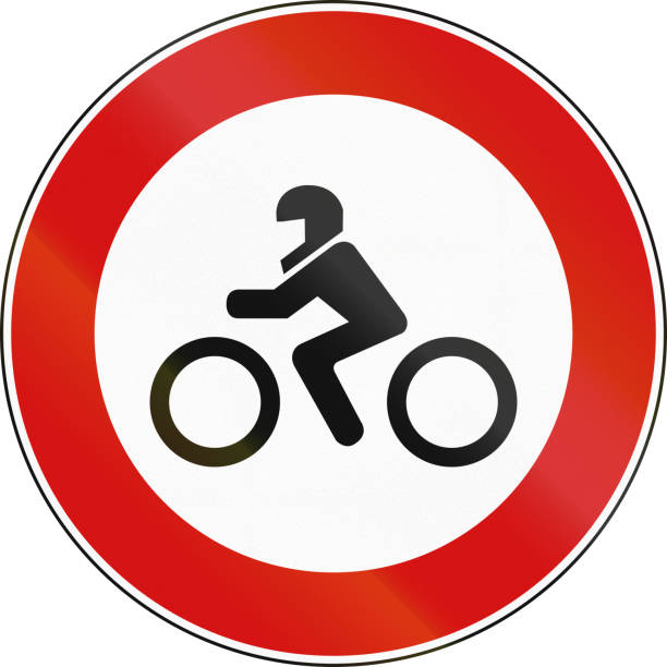 istock Road sign used in Italy - motorcycles and motor scooters not allowed 666811842