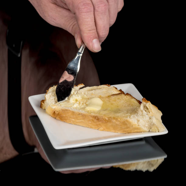 istock Butter is applied to a warm slice of beread 666811860