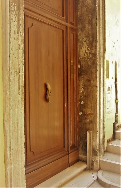 istock Warmly glowing Venetian doorway 666814356