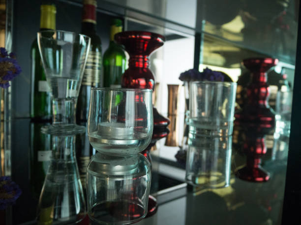 istock Glasses on the Shelf with Illumination 666834596