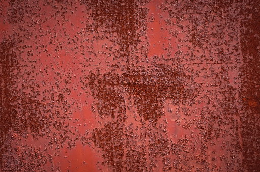 Rusty Burgundy Red sheet metal. Background texture.