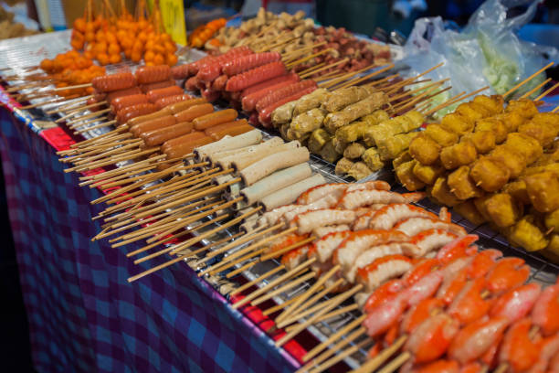 istock Thai meat ball and sausage with bamboo stick 666848650