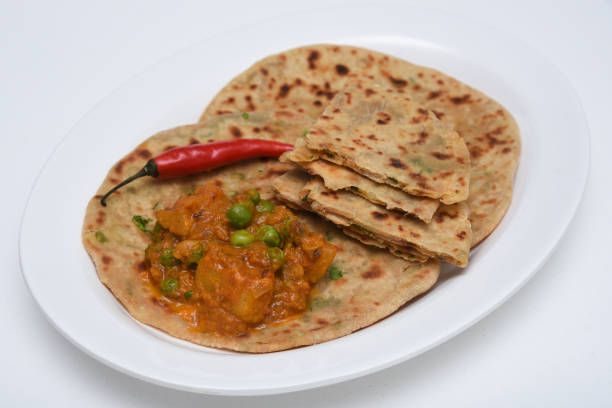 istock aloo palak paratha Indian flat bread food 666856052