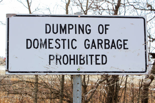 istock Dumping of domestic garbage prohibited sign 666856098