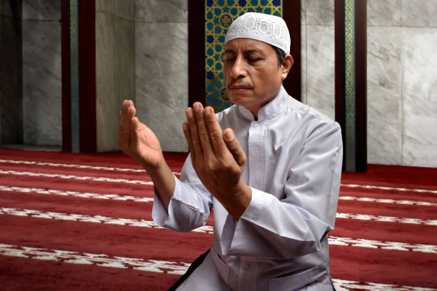 istock Old muslim man praying in mosque 666856628