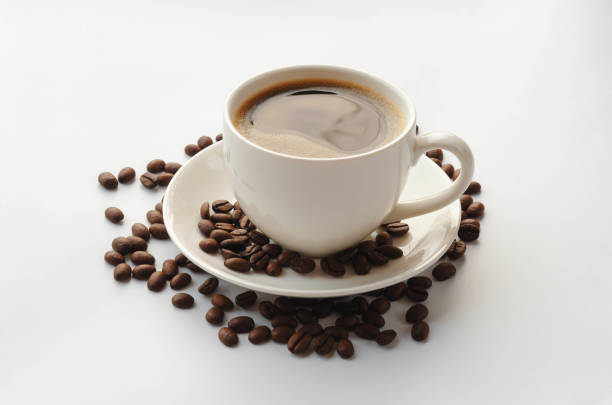 istock Coffee cup and saucer , coffee beans on a white background. 666860104