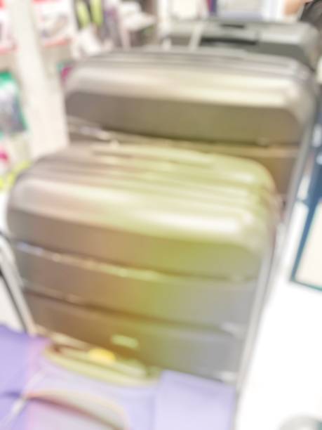 blurred image of luggage store for traveling interior. can use for background.