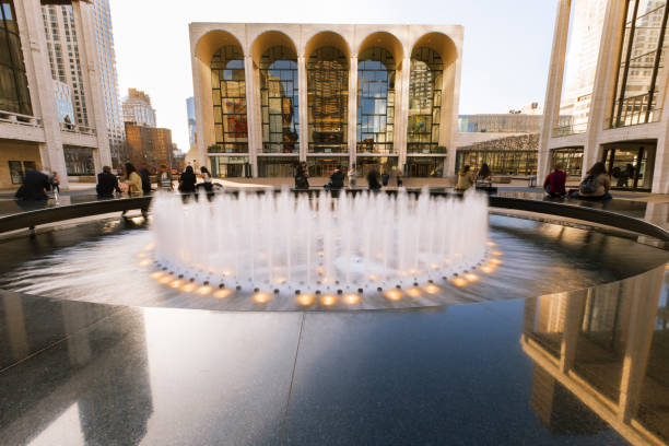 New York City, USA-April 2, 2017: View of Lincoln Center's Revson Fountain, probably the most recognizable destination for visitors and locals.