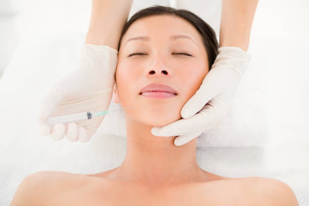 istock Attractive young woman on massage table 666880224