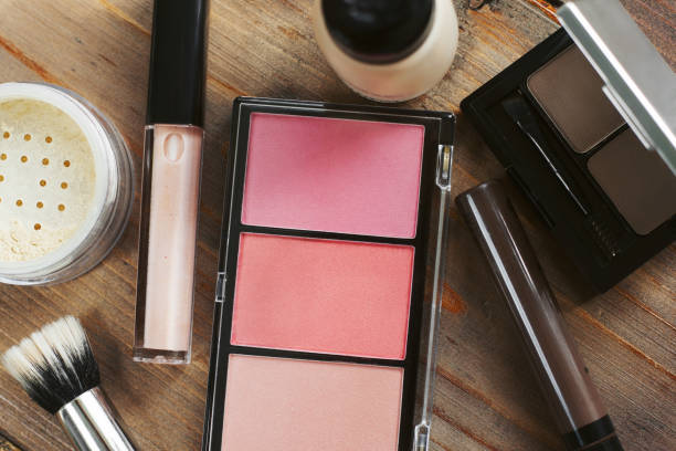 istock Set of decorative cosmetic. Face powder, eye shadow, blush, foundation, lip gloss. 666880408