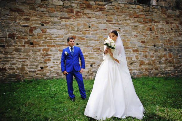 istock Young wedding couple in love on their wedding day 666883606