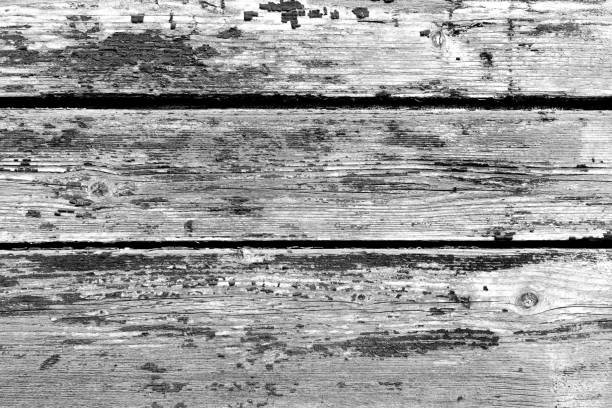 Wooden texture with scratches and cracks. It can be used as a background