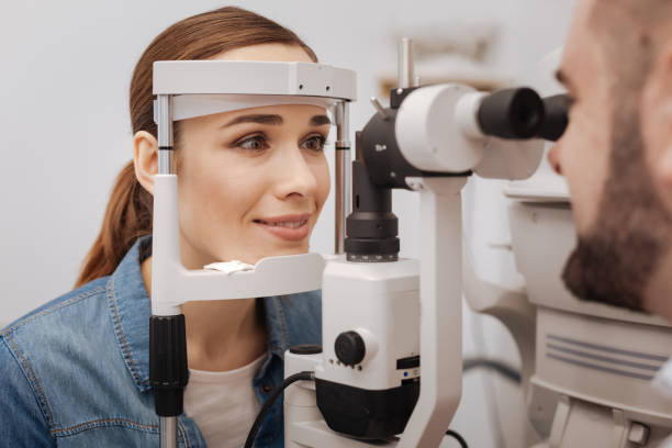 istock Beautiful attractive woman visiting an ophthalmologist 666887700